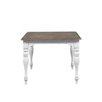 Table à manger à pieds tournés, en chêne vieilli blanc antique