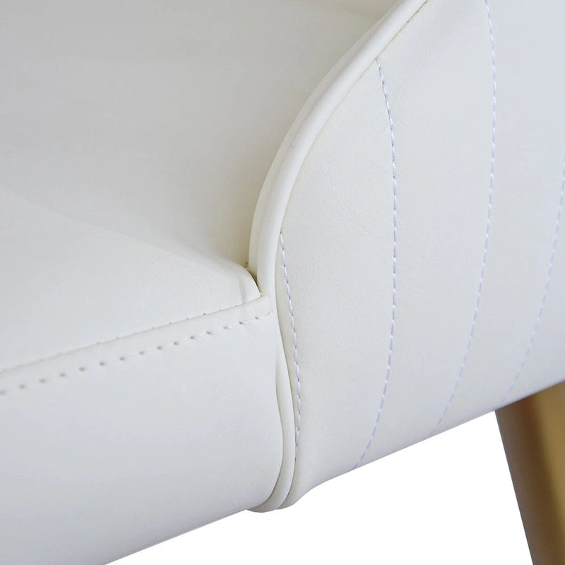 Chaise de salle à manger haute en similicuir beige capitonnée